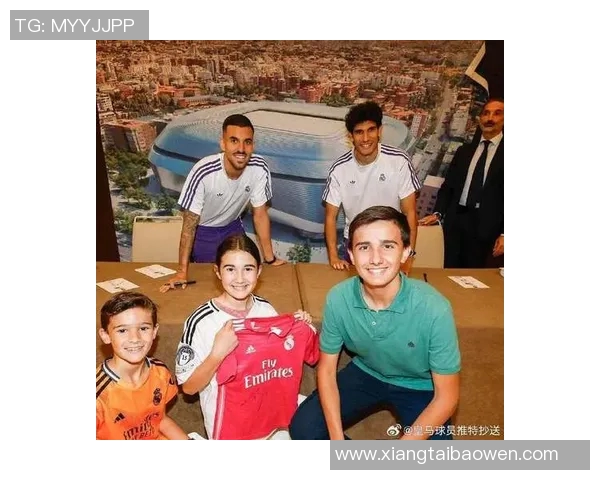 足球明星与小朋友亲密互动握手瞬间展现温暖与梦想的美好时刻